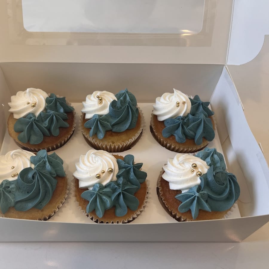 Teal and cream celebration cupcakes with gold dragees