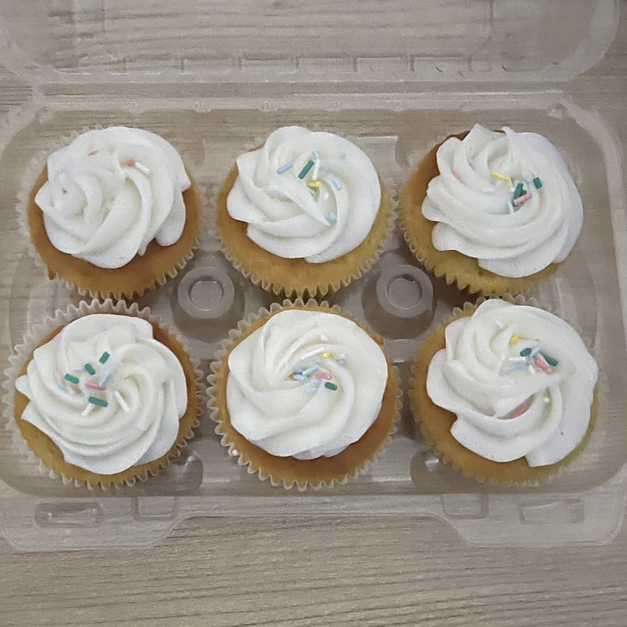 Vanilla swirl cupcakes topped with sprinkles